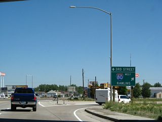 Northbound U.S. 287/Third Street meets the on-ramp to Interstate 80 west to Rawlins and Rock Springs. Through traffic on U.S. 287 could debate whether to jump on Interstate 80 west here to Rawlins via Arlington and Elk Mountain or continue northwest along U.S. 287 to Rawlins via Medicine Bow.