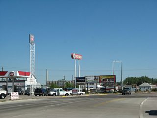 Gas stations line U.S. 287/Third Street after the Interstate 80 interchange, and all motorist services (gas, food, lodging) are available at or near this interchange. A frontage road (Boswell Drive) turns right (east) from here to provide local merchant access.
