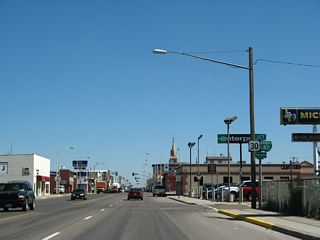 U.S. 287 (Third Street) meets U.S. 30 and the business loop for I-80 at Grand Avenue three blocks to the north of Kearney Street.