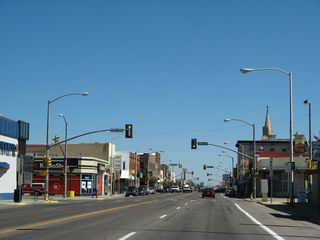 Northbound U.S. 287/Third Street approaches the signalized intersection with Garfield Street. Just before this intersection is a U.S. 287 reassurance shield, the first one we've seen since near the Colorado-Wyoming border.