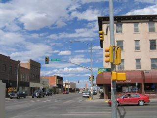 Northbound U.S. 287/Third Street meets Business Loop I-80 and U.S. 30/Grand Avenue (Lincoln Highway) at this traffic signal. Turn right for U.S. 30 and Business Loop I-80/Grand Avenue east to the University of Wyoming or turn right for grand Avenue west into downtown Laramie. Grand Avenue only travels another two blocks west of here; it ends at First Street at the edge of the Union Pacific Railroad yard. Ahead, the three routes will travel together along Third Street (from Grand Avenue north to Curtis Street).