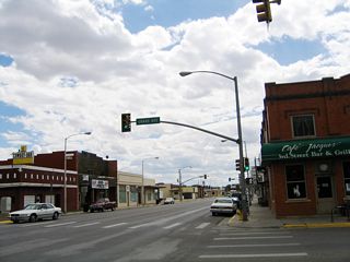 Southbound U.S. 287 and eastbound Business Loop I-80 and U.S. 30 split at the Grand Avenue intersection in downtown Laramie.