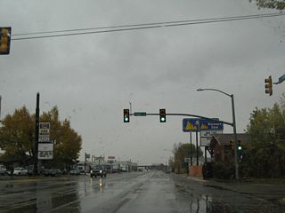 Southbound U.S. 287 approaches its signalized intersection with Russell Street. An early autumn thunderstorm dampened things on a college football Saturday.