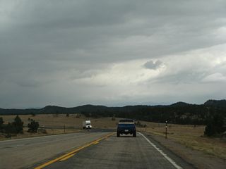 Southbound U.S. 287 continues until reaching the Wyoming-Colorado State Line. U.S. 287 passes a historic marker for the Overland Trail close to the state line. The last milepost is 425.25, but that is not the mileage for all of U.S. 287 in Wyoming. Instead, it is just part of the numbering system just for the segment of U.S. 287 south of Laramie, and it has a zero milepost of 400. The milepost numbers then increase from north to south, which is uncommon for a north-south route.