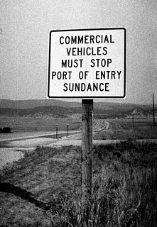 The final sign indicates that commercial vehicles also must stop at the Port of Entry on northbound Wyoming 585.
