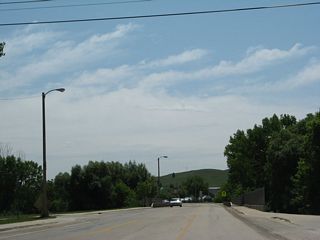 Wyoming 585 commences south from Business Loop I-90 and U.S. 14 near Downtown Sundance. The state highway crosses Sundance Creek southeast to meet U.S. 85 at Four Corners north of Newcastle.