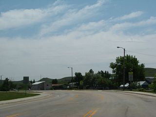 Beyond Sundance Creek, Wyoming 585 proceeds south through a small residential area.