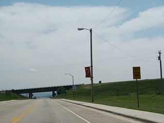 A Wyoming 585 south reassurance shield precedes the exchange with I-90 along Sixth Street.