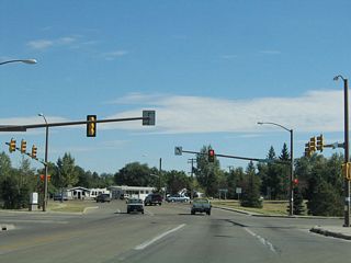 Upon reaching the base of the Norris Viaduct, Logan Avenue reaches Nationway, a major east-west arterial that skirts the northern edge of the city's lone oil refinery. Nationway starts at Lincolnway (Business Loop I-80 and U.S. 30) and travels southeast to 8th Street, then follows 8th Street east to Windmill Road, then travels northeast to meet Ridge Road, where it changes into 12th Street. The 1975 American Automobile Association map of Colorado and Wyoming's inset of Cheyenne showed Nationway as Alternate U.S. 30, perhaps as an interim route for through traffic while the modern Interstate 80 alignment was being built to the south. However, this designation does not appear in most other maps of this period.