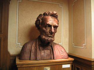 A bust of President Abraham Lincoln is located inside the Wyoming state capitol. This bust is similar to a much larger bust located at the Summit rest area along Interstate 80 at the top of Telephone Canyon at Sherman Hill (elevation 8,640 feet above sea level, the highest point on Interstate 80, U.S. 30, and the Lincoln Highway).
