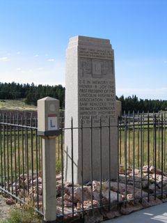 Henry Bourne Joy was the first president of the aforementioned Lincoln Highway Association (LHA), and his wish was to be buried in the Great Divide Basin in south-central Wyoming. Joy witnessed a sunset that he described as the most beautiful he had ever seen when he drove the Lincoln Highway in 1916, hence his desire. While he never was buried at the site, a monument was placed in the basin at Continental Divide Road (now Exit 184) in 1936 to memorialize Mr. Joy and the history of the transcontinental Lincoln Highway. The Joy memorial was moved in 2001 from the Great Divide Basin site due to extensive vandalism and damages made to the monument area. Now the Joy monument is found next to the Abraham Lincoln memorial at the Summit Rest Area.