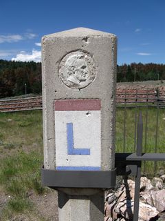 Replica Lincoln Highway markers surround the Henry Bourne Joy monument. At the nearby tourist information center, information is only available from a clerk during the summer months, but the exhibits and restrooms are open year-round. The exhibits include a historical journey of the Lincoln Highway and routing of the road up Telephone Canyon to the Summit. Wildlife information, a large regional wall map, and other exhibits are also presented inside the rest area/visitors center. A spectacular view of the surrounding Pole Mountain wilderness areas along with the Vedauwoo rocks is afforded from a deck on the back of the visitors center. To reach Pole Mountain, use Wyoming 210 east; to Vedauwoo, continue east on Interstate 80 and U.S. 30 to Exit 329.