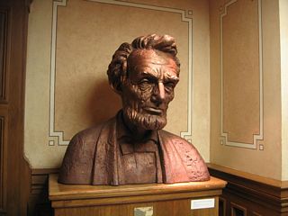 A model of the bust created by Russin is now housed in the State Capitol in Cheyenne. Similarities between the model and the actual memorial bust are evident.
