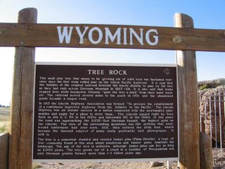 A large sign that details not only the history of Tree Rock but also the story of the Lincoln Highway is posted at the Tree Rock parking area near Milepost 333.