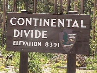 Grand Loop Road crosses the Continental Divide at an elevation of 8,391 feet above sea level in Yellowstone National Park near Old Faithful.
